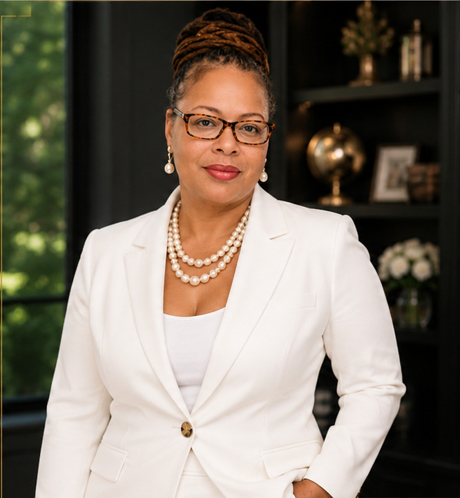 Tomika McFadden in a white executive suit